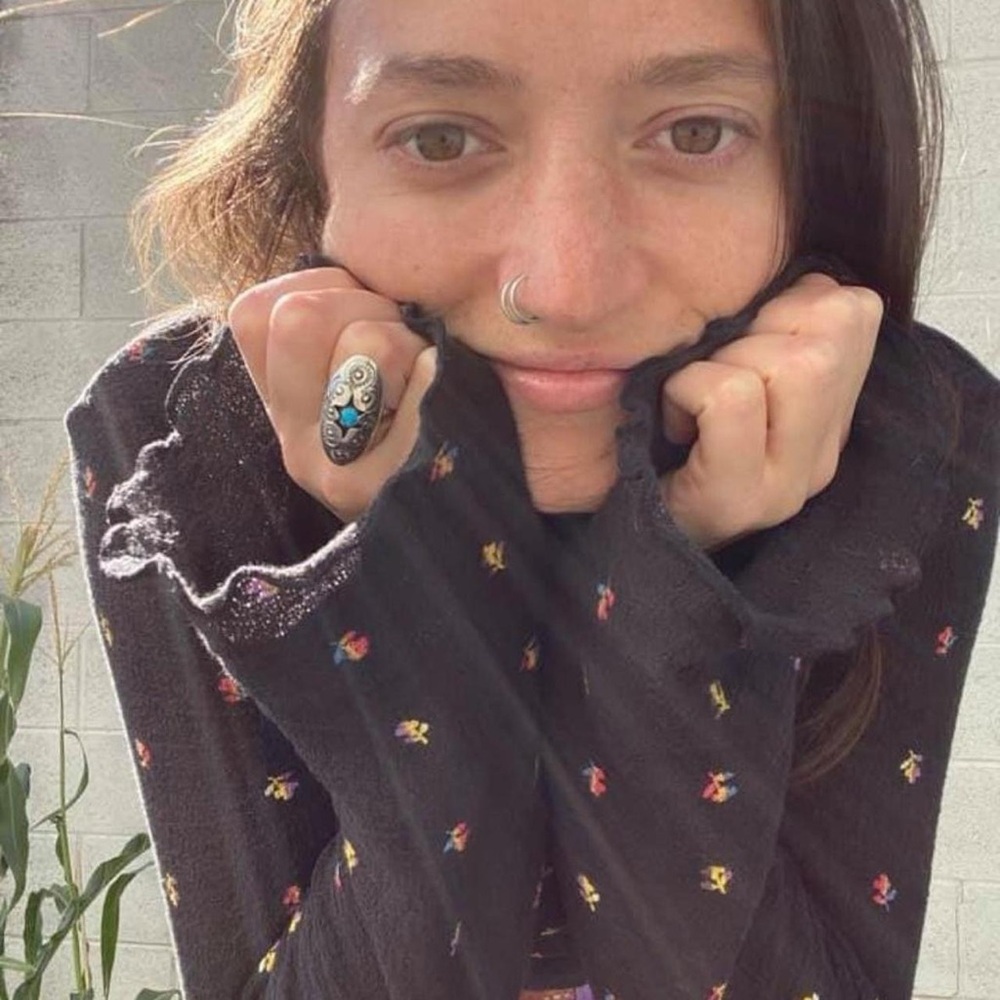 Chic Black Long Sleeve Top with Floral Accents